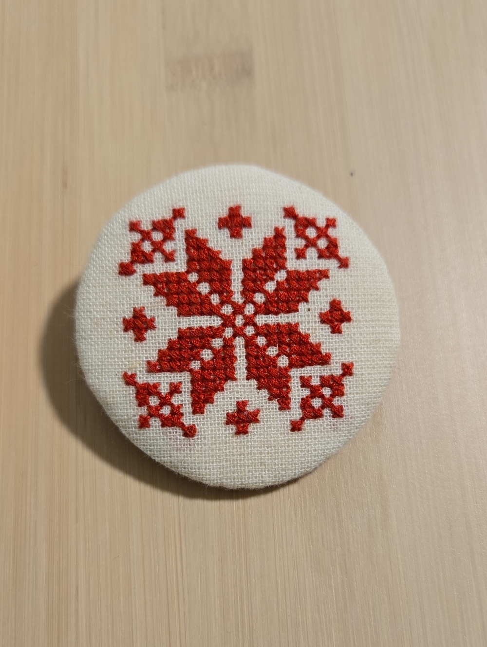 Hand-Embroidered Red Snowflake Pin Accent
